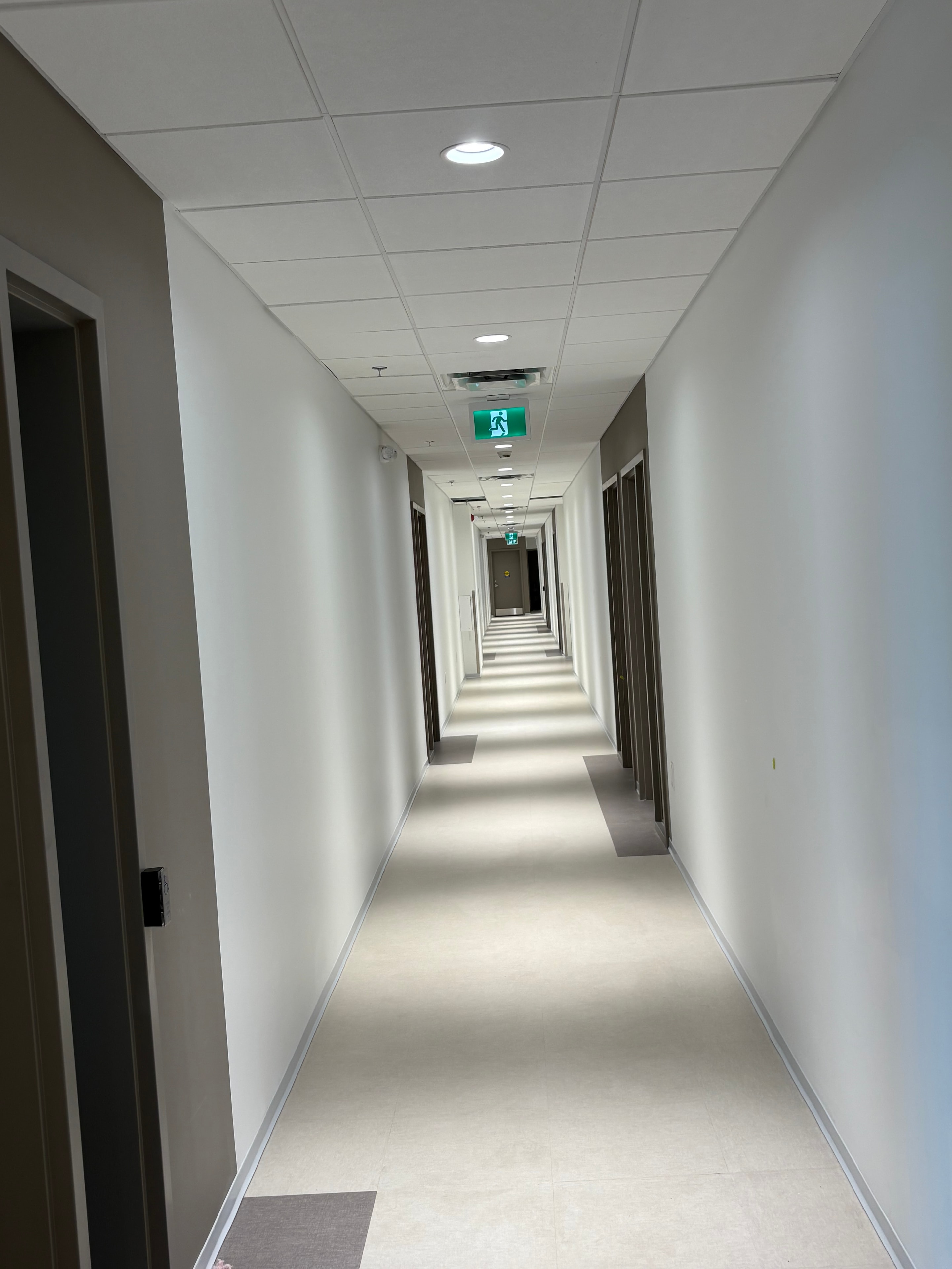 Modern office hallway with signage
